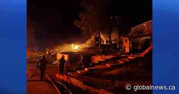 No injuries after fire rips through 2 homes, garage, nearby forest in Alberta village - Global News