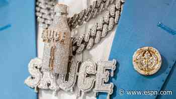 Eye-catching fits from the 2022 NFL draft include flashy jewelry, fancy suits and more