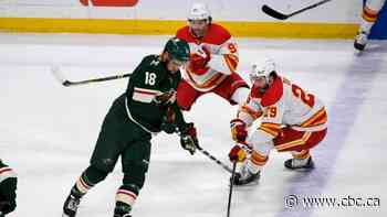 Kaprizov scores shorthanded goal 44 seconds into overtime to lift Wild past Flames
