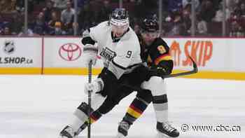 Boeser scores twice to lead Canucks past Kings in overtime