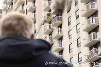 PHOTOS: Victoria firefighters pluck man from balcony in apartment building fire - Comox Valley Record