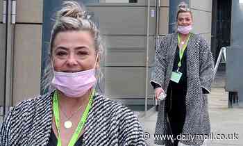 Lisa Armstrong cuts a casual figure as she takes a break from working on Catchphrase - Daily Mail