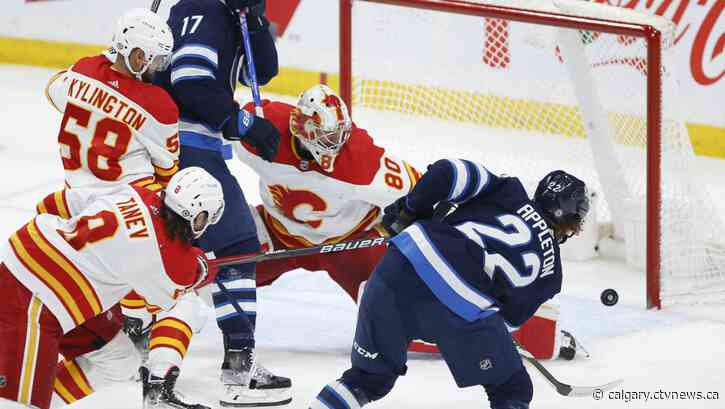 Winnipeg Jets down playoff-bound Calgary Flames 3-1 in penultimate game