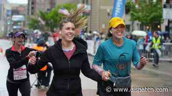 Runners brave the rain as Columbus' OhioHealth Capital City Half Marathon returns - The Columbus Dispatch