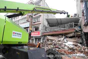 Woman rescued 50 hours after China building collapse - The Bolton News