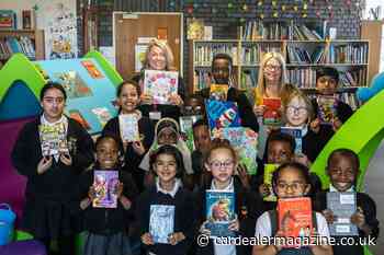 Coventry car dealership donates hundreds of books for local school to build its library – Car Dealer Magazine - Car Dealer Magazine