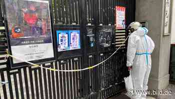 Wegen Corona - Shanghai sperrt seine Einwohner hinter Zäune - BILD