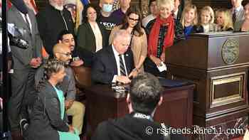 Walz signs bill to reward frontline workers, replenish unemployment insurance