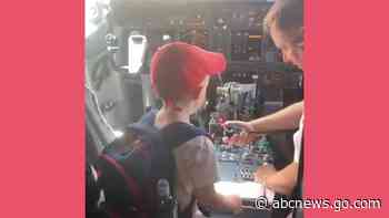 WATCH:  5-year-old cancer survivor welcomes passengers aboard flight home