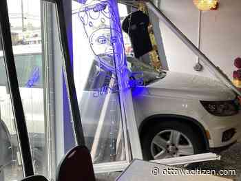 Fire service specialists called after car crashes into east-end business