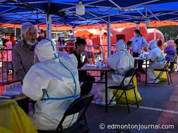 Beijing steps up COVID curbs as virus spreads in China