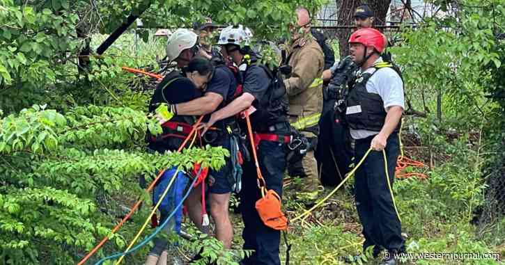 Woman Stranded in Drainage Flume Calls 911 as Water Rapidly Rises: 'I'm About to Be Swept Away'
