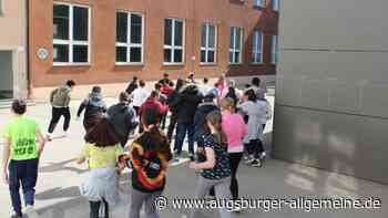 Laufen, Essen, Singen: So setzen sich Augsburger für die Ukraine ein