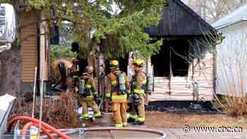 Fire burns home, damages another near Saskatchewan Drive