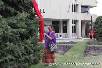 WATCH: Red Dress Day commemorated in Red Deer City Hall Park – Red Deer Advocate - Red Deer Advocate