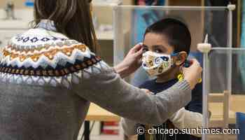 Illinois coronavirus: Masks urged for Chicago area as risk level rises to ‘medium’ - Chicago Sun-Times