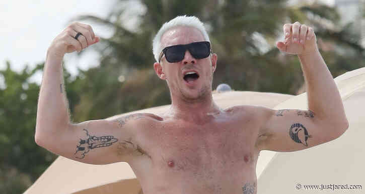 Diplo Flexes His Muscles During Beach Day in Miami