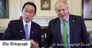 Boris Johnson munches 'Fukushima popcorn' as radioactive food rules scrapped - The Telegraph