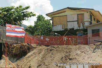 Owner of home that fell onto beach could face big fine