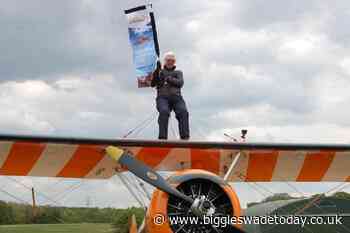 Sutton grandfather braves stomach churning wing walk for air ambulance charity Magpas - Biggleswade Today
