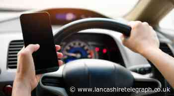 Two reported for watching TV shows on phones while driving on motorway