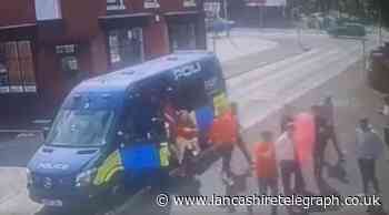 Lancashire Police investigating viral video after officers gave fans a 'lift to the pub'