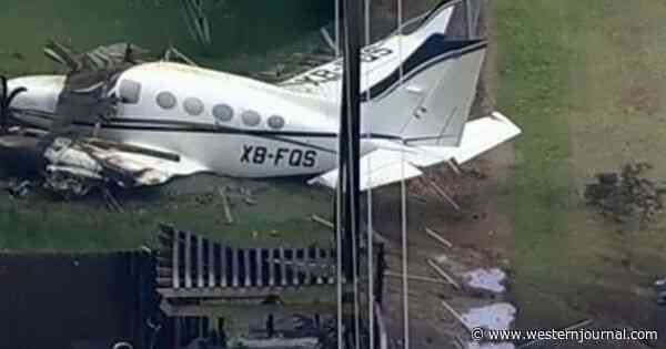 Plane Slams Into Neighborhood, Barely Missing School, Homes and an Elderly Woman Sitting in Backyard Chair