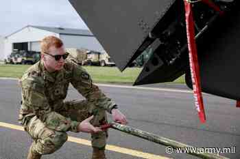 Soldiers fold Black Hawks for transport to Norway for Swift Response 22 - United States Army
