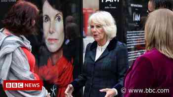 Duchess of Cornwall visits 'moving' Manchester photo exhibition - BBC