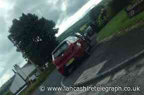 West Pennine moorland village summit over dangerous parking