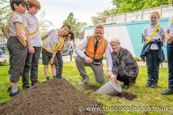 Pupils bury time capsule at Millbrook Park in Mill Hill