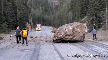 Falling rocks slows traffic on Hwy 93S north of Radium Hot Springs, B.C.