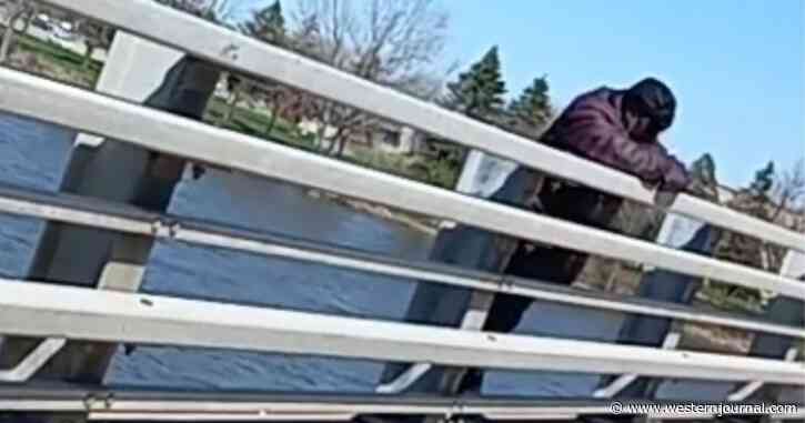 Locals Work Together to Save Suicidal Woman: Officer Dives to Grab Her Leg as She Jumps Off Bridge