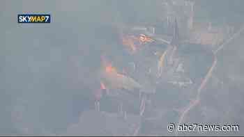 LIVE: At least 13 homes up in flames as SoCal brush fire explodes in size