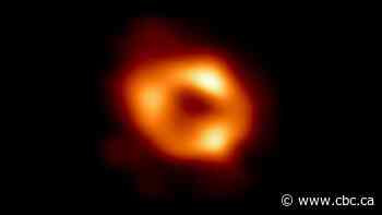 Astronomers reveal first photograph of a monster black hole at the ...