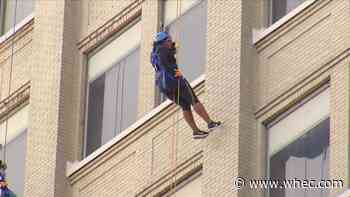 News10NBC Today Anchor and Reporter Raven Brown repels down Kodak Building