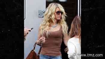 Jessica Simpson Shows Off Dramatic Weight Loss with Farrah Fawcett Twist
