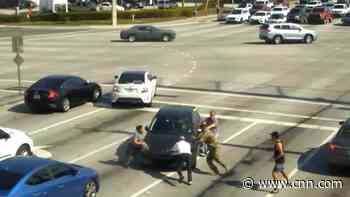 'Heroes' stop rolling car after driver has medical emergency - CNN