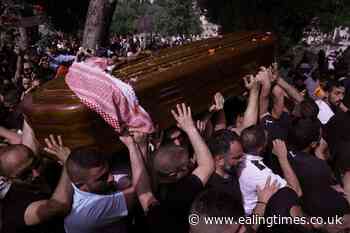 Pallbearers drop journalist's coffin as Israeli police hit mourners with batons - Ealing Times