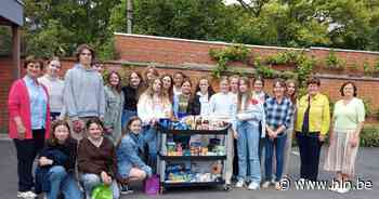 Prizma Middenschool schenkt volle winkelkar aan Sociaal Huis - Het Laatste Nieuws