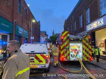 Eight fire engines attend building blaze as police close off city centre roads