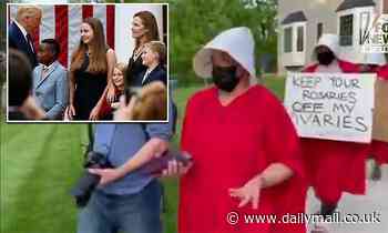 Protester says Justice Barrett, mom of 5 biological kids, doesn't know about full-term pregnancy - Daily Mail