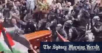 ‘Deeply disturbed’: Israeli police beat pallbearers at Al Jazeera journalist’s funeral