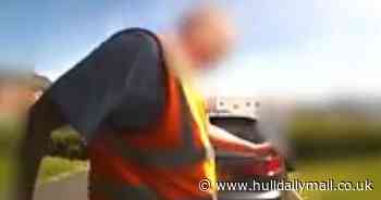 Distressing footage as postman appears to kick dog across drive - Hull Live