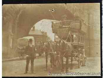 Century-old picture of horse-drawn bus at Bushey Arches