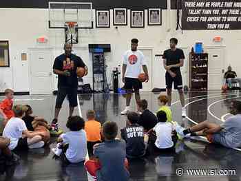 Sydney Curry, J.J. Traynor Use NIL to Hold Local Basketball Camp - Sports Illustrated
