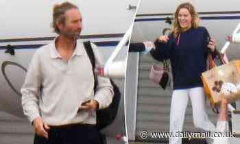 Justin Hemmes and his model girlfriend Madeline Holtznagel arrive in Sydney via private jet - Daily Mail