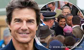 Tom Cruise is mobbed as he arrives for his secret tole at The Queen's Platinum Jubilee Celebration