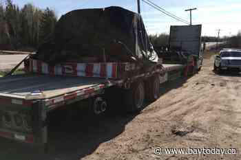 Cops pull over transport driving with missing wheel - BayToday.ca