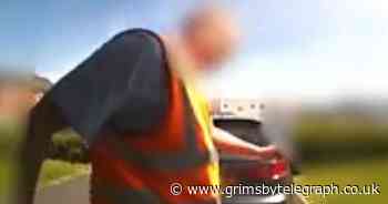 Distressing footage as postman appears to kick dog across drive - Grimsby Live - Grimsby Live